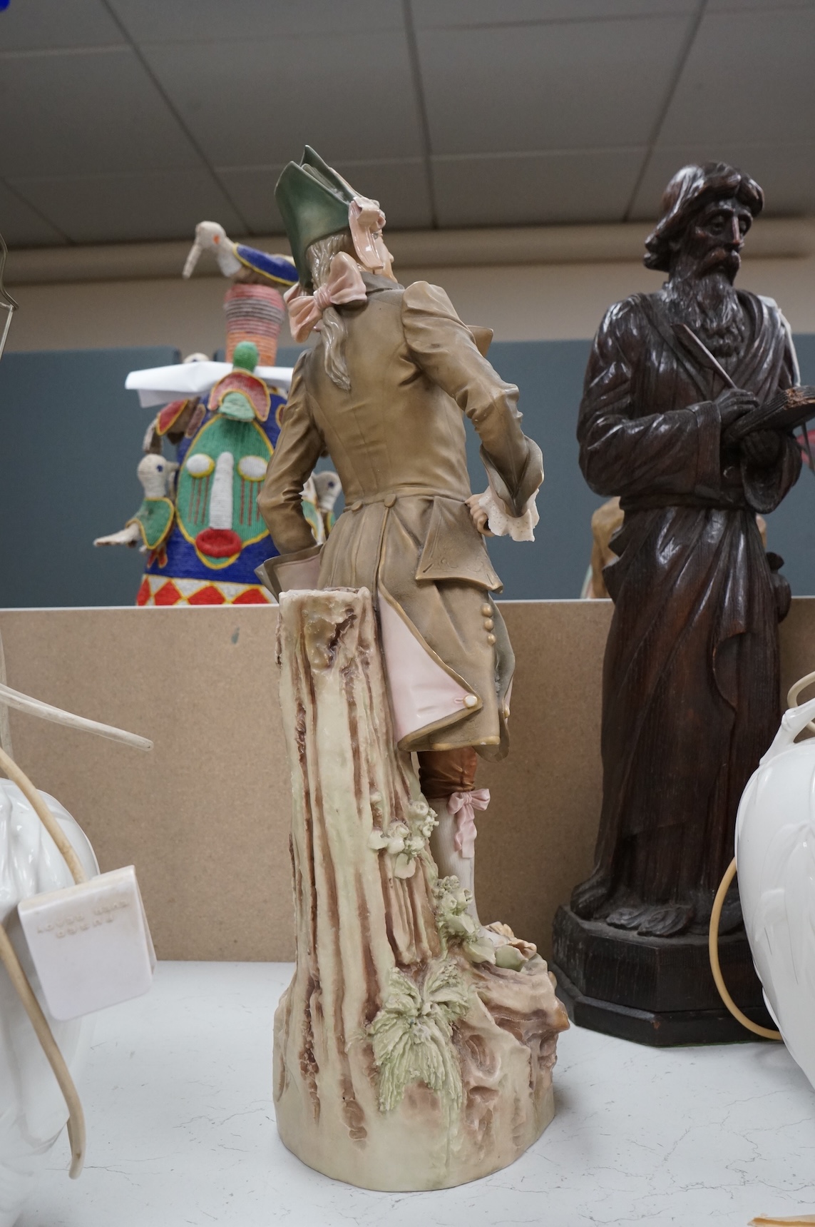 A large Royal Dux figure of a gent, 60cm